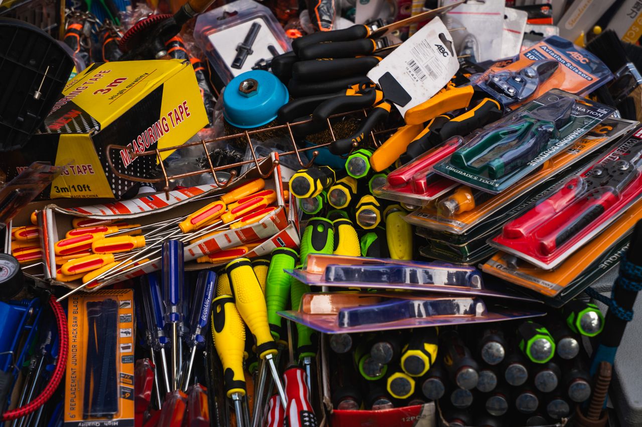 A vibrant collection of tools and hardware on display at a street market in Colombo, Sri Lanka.